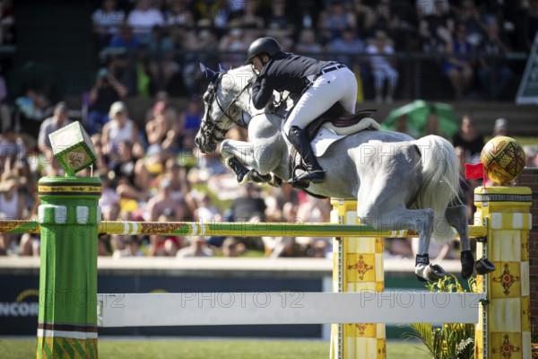 Matthew Sampson of Great Britain and riding Daniel compete in the first round of the 1.60m CPKC International during the Spruce Meadows Masters, presented by Rolex, in Calgary, Alberta, Canada, North America