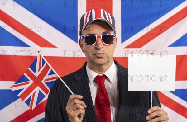 British male businessman with Brexit banner and UK flag
