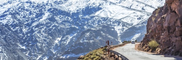 Atlas mountains in Morocco, Africa. Web banner in panoramic view. Road