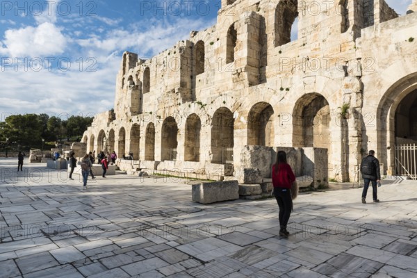 Athens Old Town, Attica, Greece, 12 28 2019 Tourists walking around the theater at the Acropolis, Europe