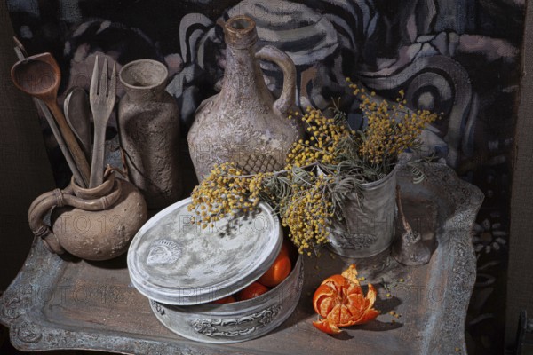 Still life with handmade artworks on a wooden studio background