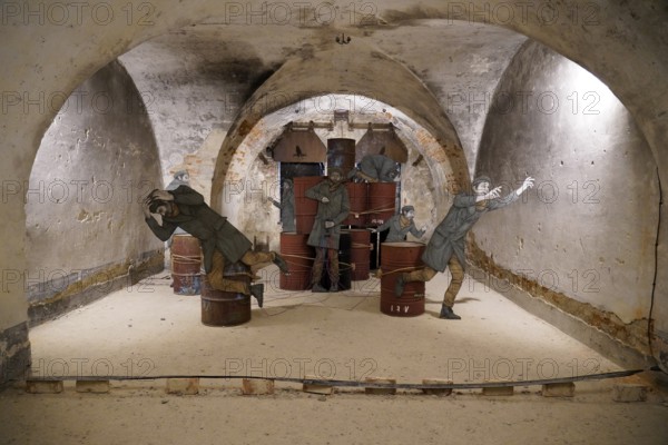 MAUSA VAUBAN, Museum of Urban Art and Street Art, Neuf-Brisach Fortress, France, Europe, sculptures of human figures depicting an escape scene in a cellar surrounded by old walls, Europe