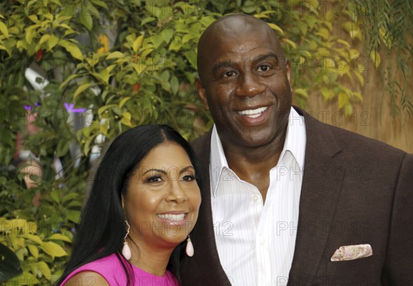 Earlitha Kelly and Magic Johnson at the Los Angeles premiere of 'The Legend Of Tarzan' held at the Dolby Theatre in Hollywood, USA on June 27, 2016., Hollywood, California, USA, North America