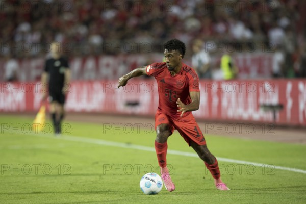 Football match, Kingsley COMAN FC Bayern Munich leading the ball to the left, football stadium Donaustadion, Ulm, Germany, Europe