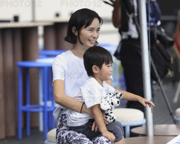 Kei Nishikori wife Mai and son watching a practise session of husband/father Kei Nishikori, Australian Open 2025, Melbourne Park, Melbourne, Victoria, Australia, Oceania