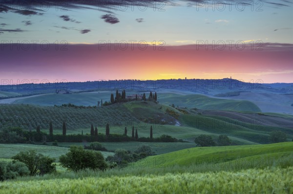 Tuscany landscape at sunrise with farm house and hills, Italy, Europe