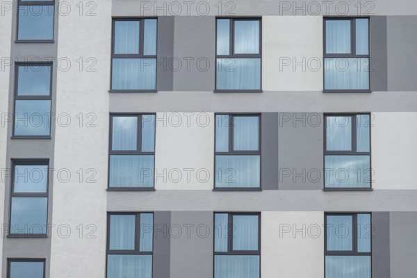 Facade of an modern large house, wall with windows