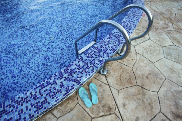 Swimming pool in the resort. View from water