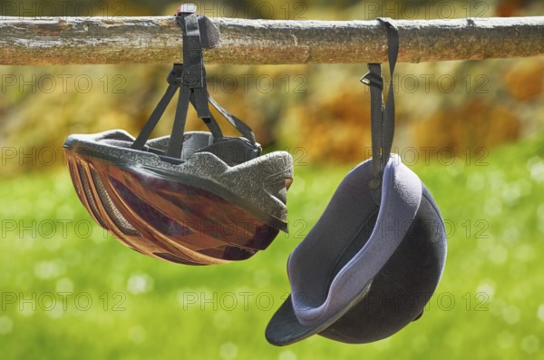 Two jockey helmets hanging from the beam Varna, Bulgaria, Europe