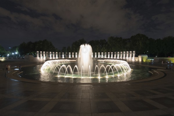 WASHINGTON, USA, AUGUST 12, 2022, Fountain at World War II memorial at night in Washington, USA, North America