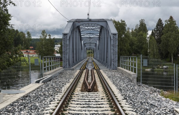 Segersta, Bollnas Municipality Sweden, 08 03 2019: Straight single railwaytracks through the Swedish countryside