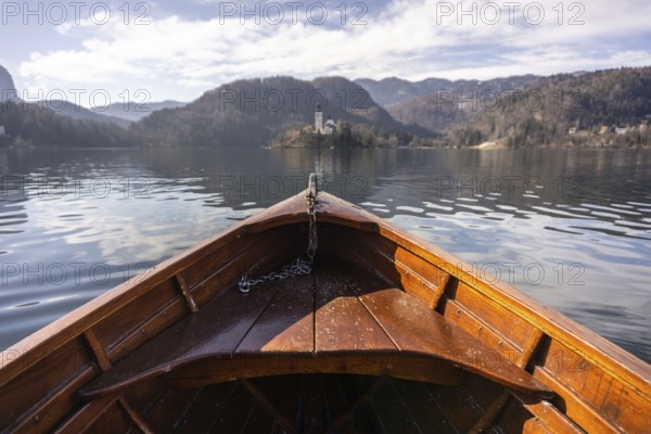 Wooden rent boat on a Bled lake, famous tourist destination in Slovenia
