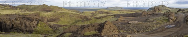Moss-covered volcanic mountain landscape, panoramic shot, Pakgil, Iceland, Europe