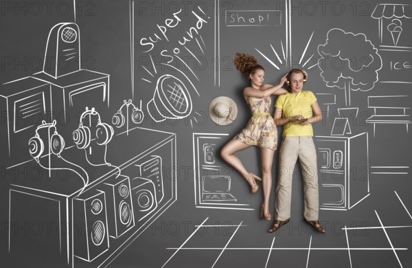 Love story concept of a romantic couple against chalk drawings background. Male listening to the music in the headphones and surfing the internet, female trying to attract his attention
