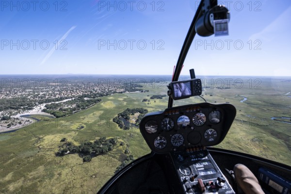 Okawango Delta Pfannenstil, Helicopter cockpit over the Okawango Delta, aerial view, Botswana, Africa