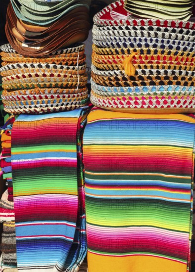Mexican serape colorful stacked and charro hats mariachi