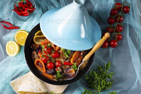 Delicious spicy beef cooked with various vegetables in tagine