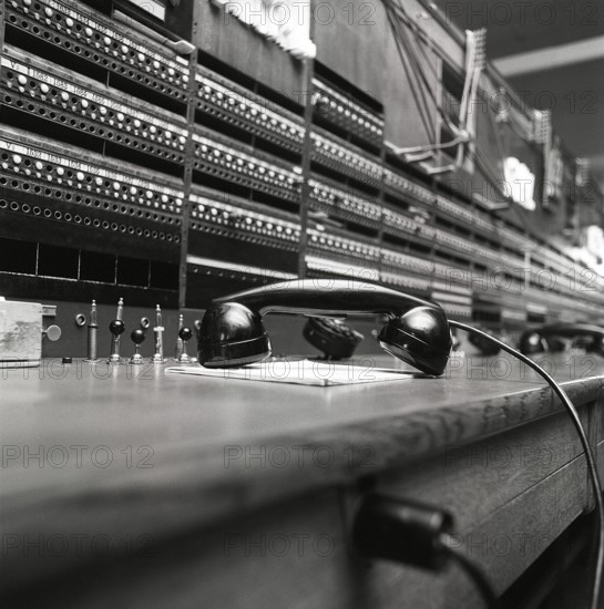 Telephony in the 1970s. Interior from an empty room with a large switchboard visible. Technology of the past that no longer is in use or the staff of it has not yet sat down to work at it. It is a manual switchboard where a human operator is needed to connect the calls manually. Sweden 1971 Kristoffersson ref ED