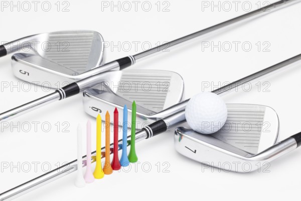 Titanium golf clubs on the white background