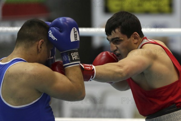 Sofia, Bulgaria. 27th February, 2021. Narek Manasyan (red) of Armenia and Radoslav Pantaleev of Bulgaria fight in their final round of Heavy (91kg) category of the 72-nd International Boxing Tournament Strandja 2021, Sofia, Bulgaria, Europe
