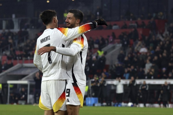 Goal scorers among themselves: Kai Havertz (Arsenal FC) celebrates his colleague Tim Kleindienst (Borussia Mönchengladbach) after his goal to make it 7-0 during the UEFA Nations League match: Germany v Bosnia-Herzegovina, Freiburg, Germany / Germany