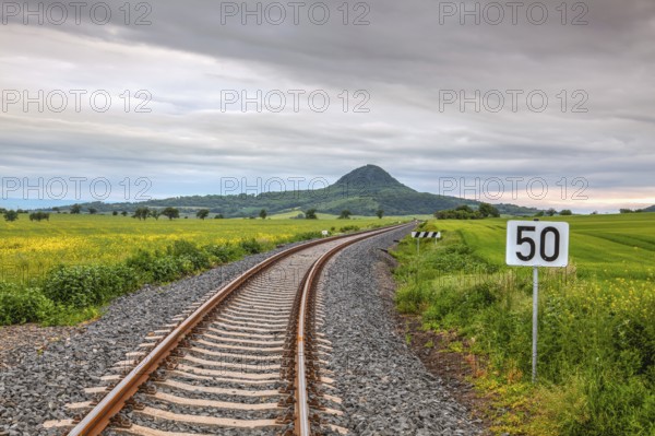 Railway track in Central Bohemian Highlands, Czech Republic. Central Bohemian Uplands is a mountain range located in northern Bohemia. The range is about 80 km long