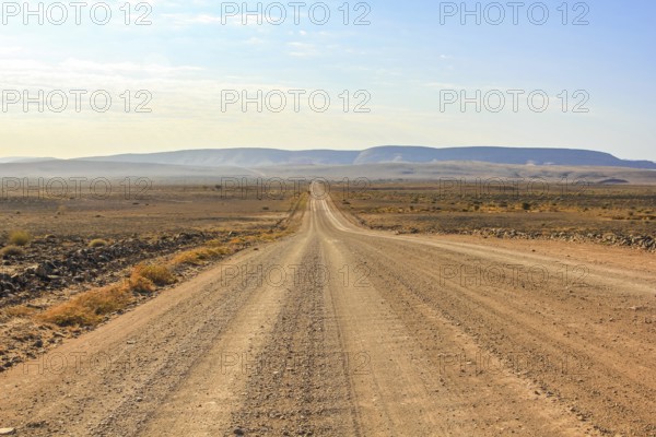 Gravel road to the Fish River Canyon, south of Namibia, Africa. Dry season