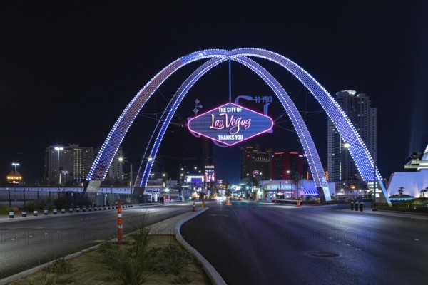 A picture of the Las Vegas Boulevard Gateway Arches at night