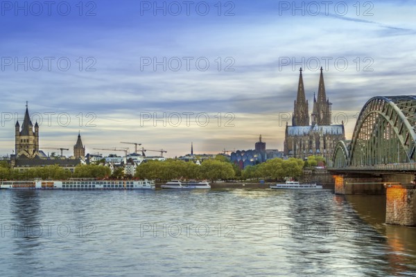 View of Historic center of Cologne with Hohenzollern Bridge from Rhein river, Germany, Europe