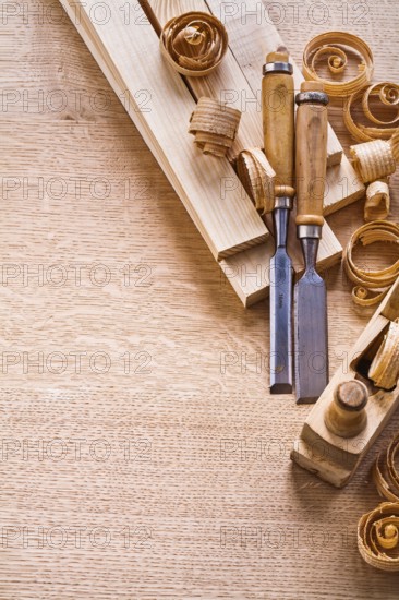 Organized copyspace carpentry chisels planks woodworkers plane on wooden board