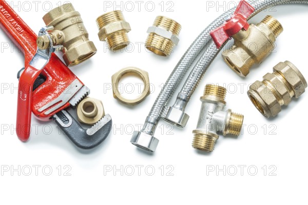 Plumbing tools walves fixtures adjustable wrench isolated on white