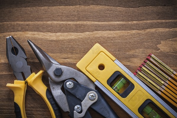 Set of pliers sharp steel cutter construction level wooden meter