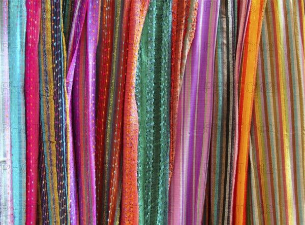 Indian colorful scarf in a row scarves vivid colors stripes