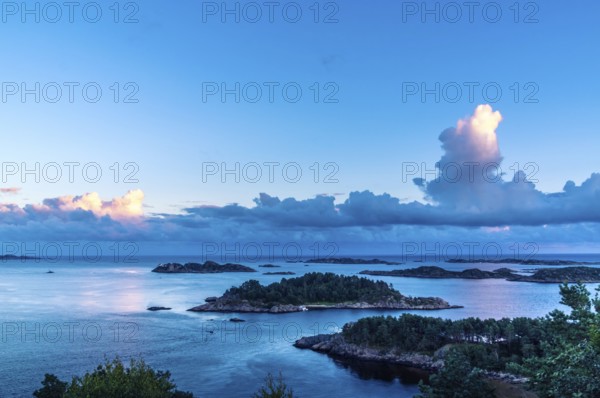 Beautiful Sunset at the Seaside at the south Coast of Norway with a view over the sea. Beautiful Sunset at the Seaside at the south Coast of Norway
