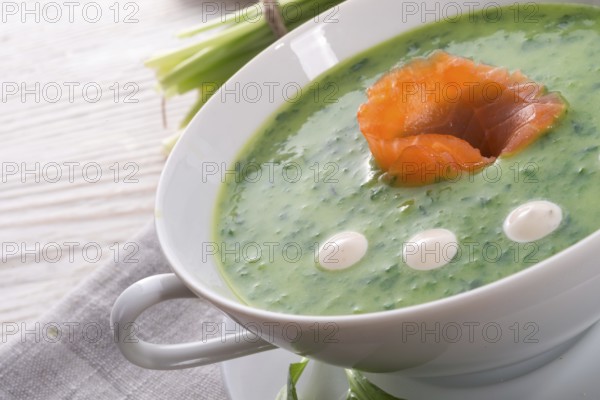Bear allium soup with smoking salmon