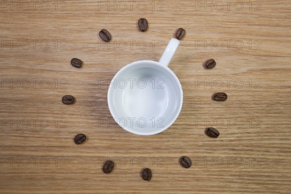 Coffee Time - Empty coffee cup and clock of coffee beans