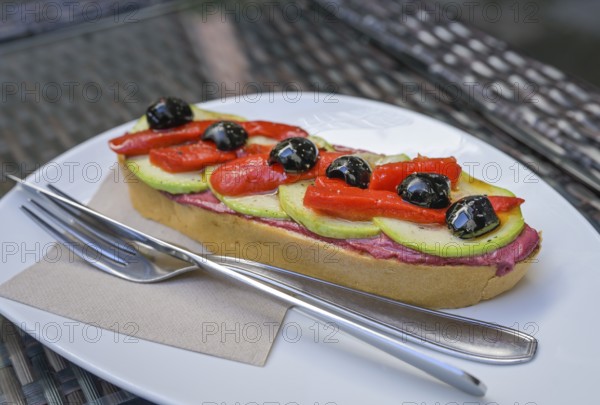 Bread with olives, peppers, avocado and beetroot, tapas in Tenerife, Spain, Europe