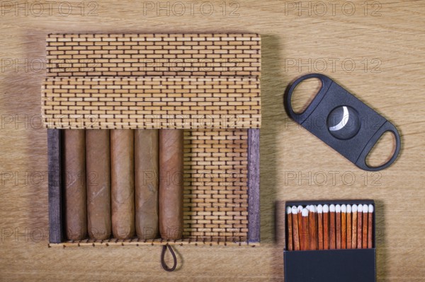 Luxury Cuban cigars on the wooden table