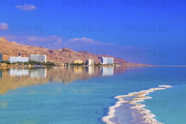 The shoaled Dead Sea at coast of Israel. Emerald water of the Dead Sea