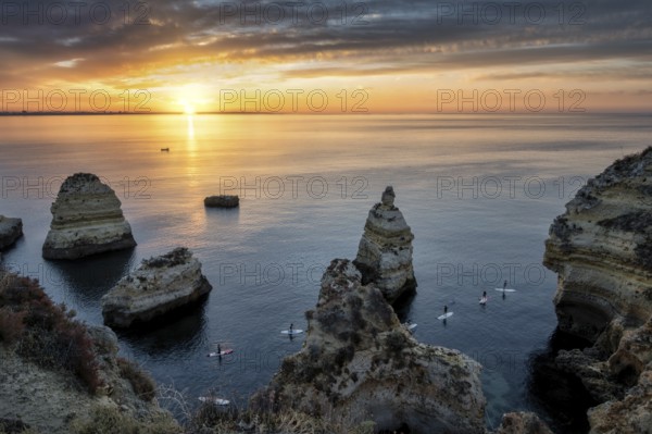 Lagos Praia da Balanca, Portuguese coast near the city of Lagos in the light of the rising sun