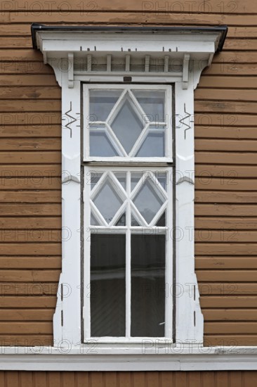 Kärki building or Kärjen talo, 1905, by Otto Dahl represents beautiful early 1900s wooden architecture. Detail of window frame. Salo, Finland. 2020