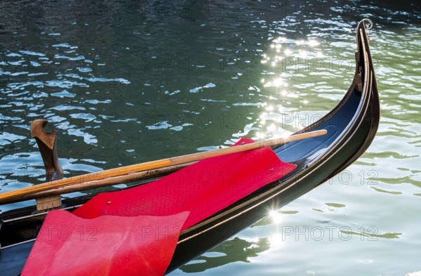 Ancient gondolas in Venice. Close up black gondola