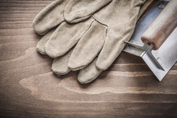 Working glove and angle former on wood board