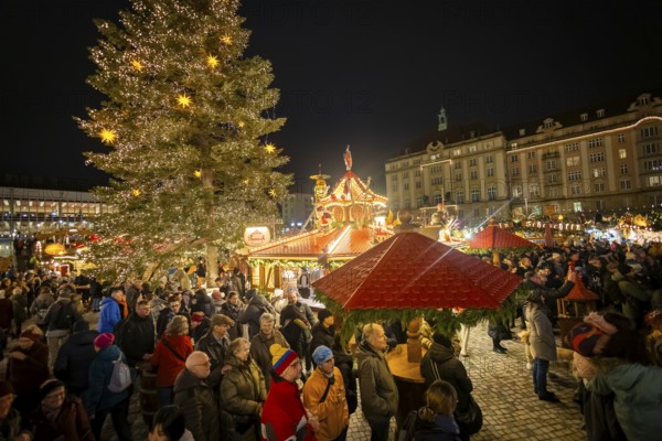 The Dresden Striezelmarkt is a Christmas market in Dresden. It has been held in Advent since 1434, usually on the Altmarkt square, and attracts an average of around two million visitors every year. It is the oldest certified Christmas market in Germany. Stage programme. Dresden, Saxony, Germany, Europe