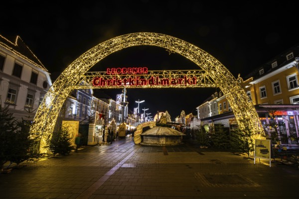 Archway, illuminated entrance to the Christmas market, night shot, main square of Leoben, Styria, Austria, Europe