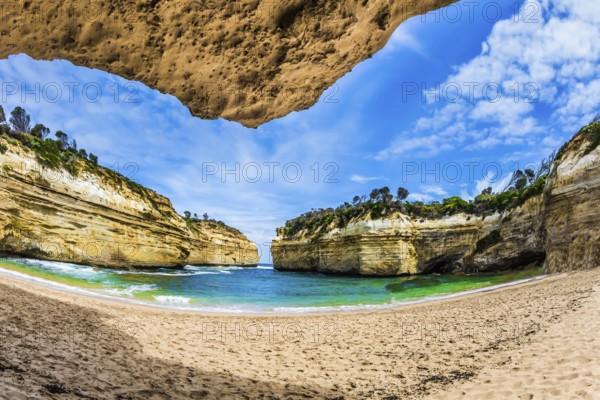 Magnificent little beach in the bay of Pacific ocean. The Great Ocean Road of Australia. The concept of exotic, active and photo-tourism