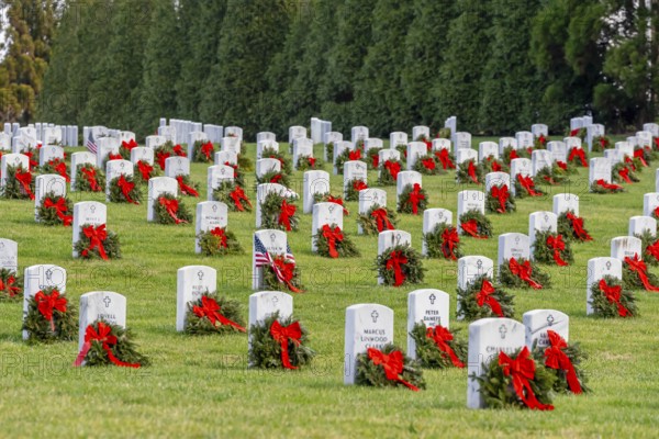 Atop a hill, a veterans cemetery with white headstones and the American flag evokes deep honour, sacrifice, and enduring national pride, Salisbury, United States of America