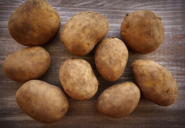Organic potatoes on a wooden board