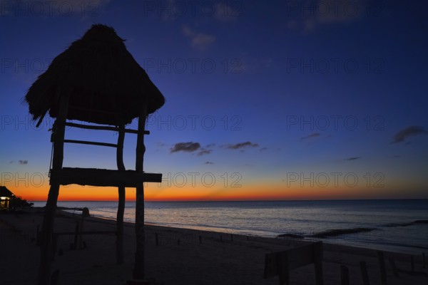 Holbox island sunset beach tropical hut in Mexico