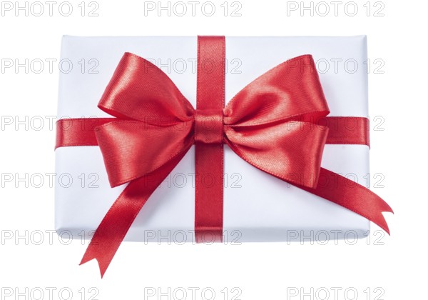 White wrapped gift box with red ribbon isolated on white